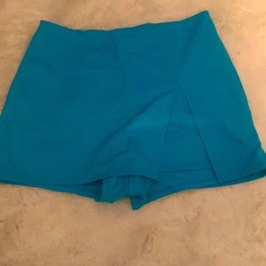 This is a pair of light blue skorts.